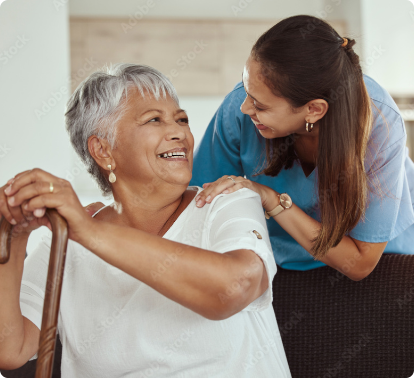 SALMON Health and Retirement staff member congratulating a resident on their physical therapy progress