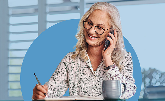 phone call mature woman writing office meeting date notes networking with client business corporate career female ceo investor with mobile discussion planning contact