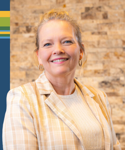 Photo of Susan Melvin smiling for camera