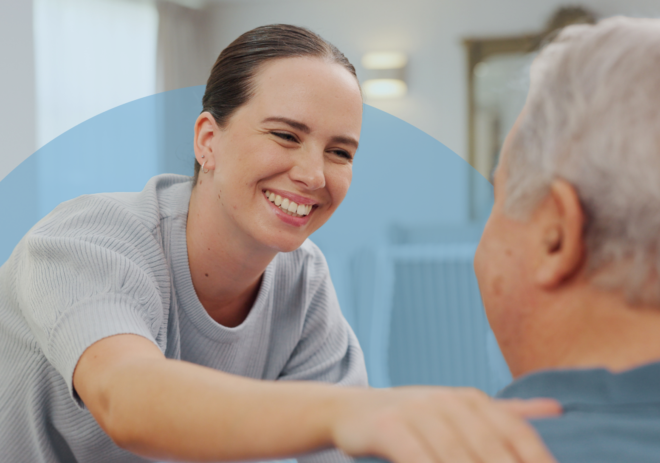senior man with caregiver giving support