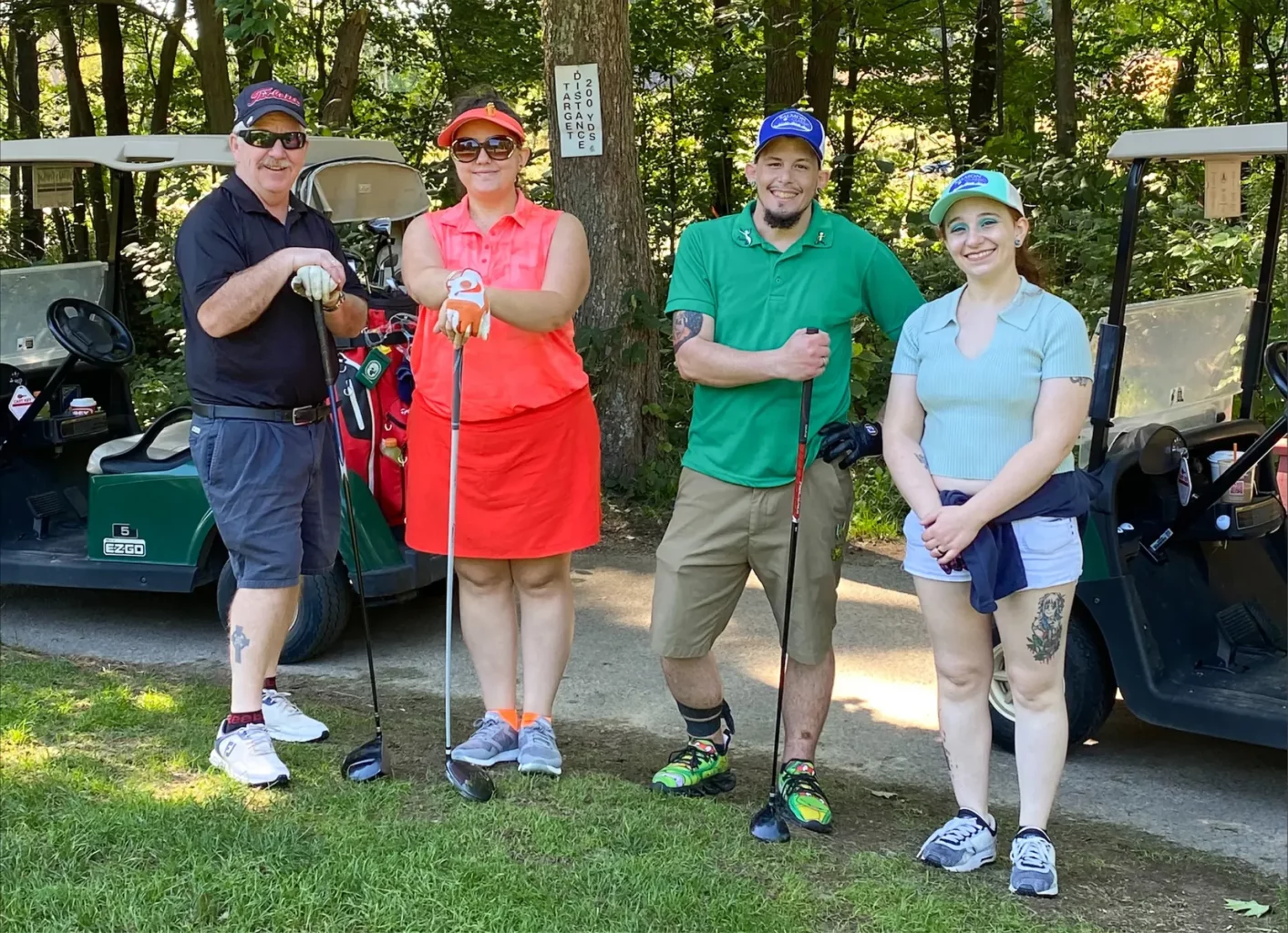 SALMON team member at a golf outing playing golf