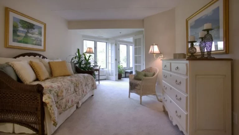 SALMON at Westborough The Willows living room with a love seat and dresser