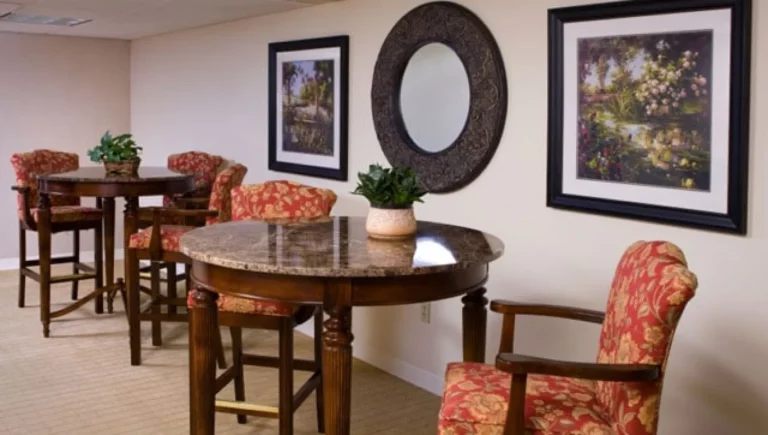 SALMON at Westborough The Willows sitting lounge with cushioned seats and granite topped tables